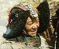 Old Zanskarie women puting on a perak.