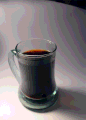 Pouring cream into drip coffee.